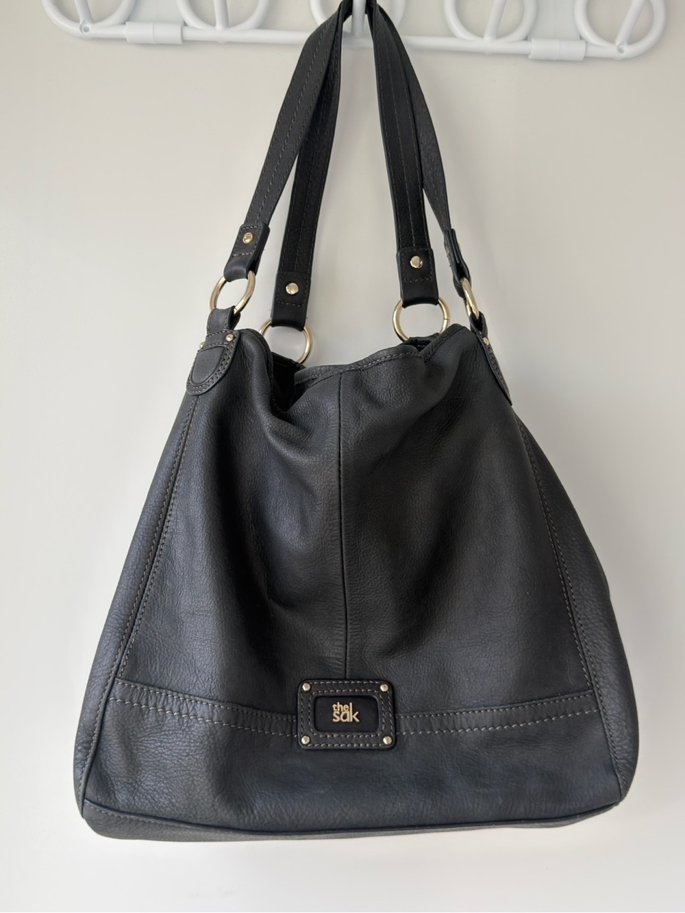The Sak Black Leather Hobo Shoulder Bag with Gold Hardware